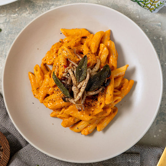 Dinkel-Penne in Kürbissauce mit Pilzen