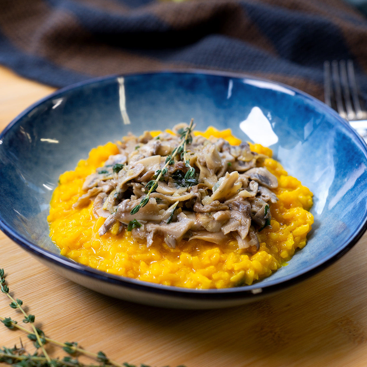 Safranrisotto mit gebratenen Pilzen